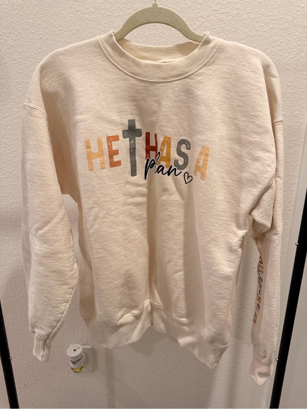 Hanes Cream Crewneck Sweatshirt with Multicolor 'He Has A Plan' Graphic